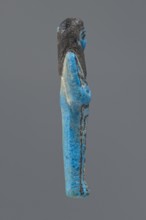 Ushabti Henut-netjeru, Henut-netjeru private name. Mummy-shaped figurine; shabti. Arms crossed on