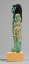 Shabti of the Lady of Renu, Mummy-shaped figurine made of blue faience with dark painted details;