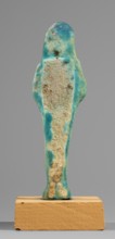 Ushabti, back pillars, hoes, funerary figurines, wigs, grave goods; Mummy-shaped figurine, standing