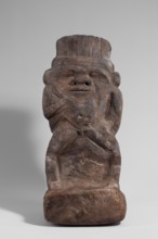 Bes, Bes mythology. Bes naked, standing on a high base, leaning against a pillar. The head is
