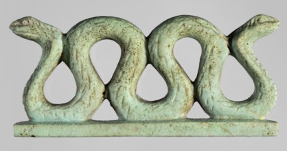 Amulet – two-headed snake;, Two-headed snake with vertical coils on a base, with delicately carved