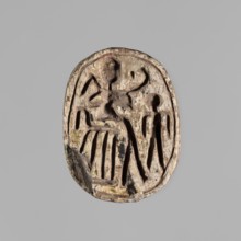 Scarab with a silhouette of a ruler on a throne. The scarab has on its base a representation of a