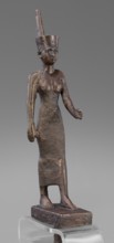 Figurine of the goddess Neith. The goddess Neith is depicted in a striding position, with her right