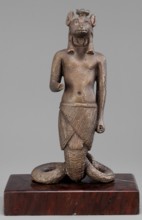 The god Anubis in the form of a jackal-headed deity, Anubis mythology. Figurine of Anubis in the