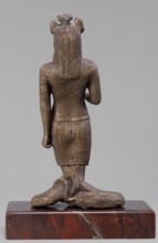 The god Anubis in the form of a jackal-headed deity, Anubis mythology. Figurine of Anubis in the