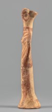Female idol, unknown Mycenaean workshop. Votive female figurine in the shape of the letter phi—legs