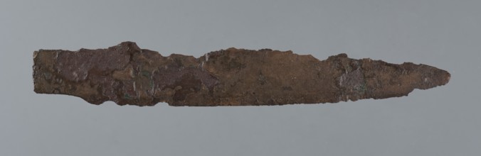 Dagger blade, unknown Mitannian workshop. Blade of a short dagger with a centric point. At the