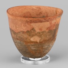Mug, unknown Northern Mesopotamian workshop. Mug with slightly S-shaped walls and a small flat