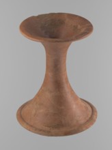 Vessel base, Funnel-shaped vessel base, narrowest at about 2/3 of the height. Both rims are oval in