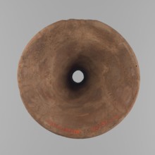 Vessel base. Funnel-shaped vessel base, narrowest at about 2/3 of the height. Both rims are oval in