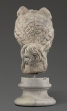 Head of the goddess Aphrodite; maker, Greek sculpture, female portrait; hair tied in a bow at the