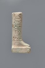 Ushabti fragment, Mummy-shaped figurine grave good. Fragment of the legs preserved from the knees
