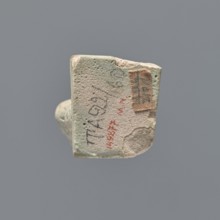 Ushabti fragment, mummy-shaped figurine; fragment of the legs preserved from the knees down. On the