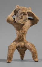 Satyr figurine. Clay figurine depicting a satyr with a face stylized as a mask with protruding ears