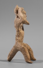 Satyr figurine. Clay figurine depicting a satyr with a face stylized as a mask with protruding ears