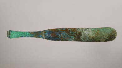Scraper, metal scraper with a typical slightly curved shape consisting of a handle and a blade with