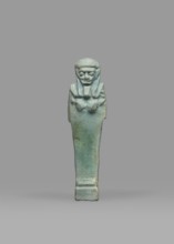Ushabti, Mummy-shaped funerary figurine shabti, standing on a base, back supported by a