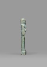 Ushabti, Mummy-shaped funerary figurine shabti, standing on a base, back supported by a