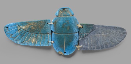 Winged scarab; flat-bottom scarab with attached wings right wing possibly completed or chipped