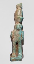 Amulet of Horus in the form of a falcon sitting on a rectangular base with a double crown on its