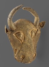 Protoma; bull's head relief mask made in gold using repoussé, granulation, and filigree; eyes,
