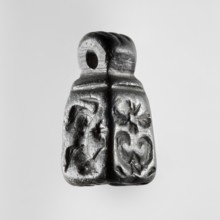 Stamp seal with figural representations. Glyptic, stamp seal in the form of a truncated pyramid on