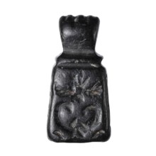 Stamp seal with figural representations. Glyptic stamp seal in the form of a truncated pyramid on a
