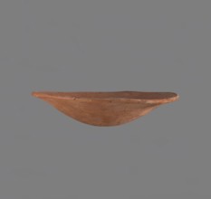 Bowl. Low bowl with irregular, strongly flaring walls and a rounded bottom. Rounded rim, slightly