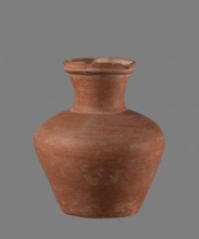 Jug with biconical belly. Vessel is widest at about half its height; shoulders broad, not very