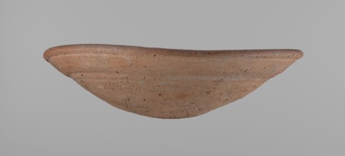 Bowl. Shallow bowl of rounded, asymmetrical shape with a rounded, flaring, irregular rim. Surface