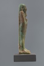 Mummy-shaped shabti of Horus inscribed Shd Osiris Hor born of Her-ib, justified by the voice,