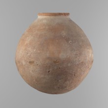 Vessel with an almost spherical belly, widest about 1/3 of the vessel's height. Sloping shoulders.