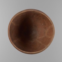 Bowl. Large conical clay vessel, rounded bottom, straight slightly tapering spout; widest about 4/5