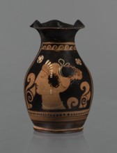 Red-figure oinochoe. Oinochoe with a flat foot separated by a ring, an oval belly, and sloping