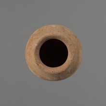 Vessel by, Egyptian pottery ceramic conical vessel tapering toward the bottom, irregular, widest