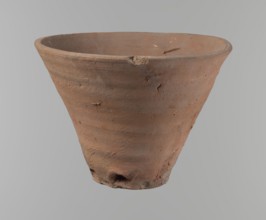 Bowl. Vessel flower pot with a conical shape and a flat bottom. Irregular walls. Straight, flat,