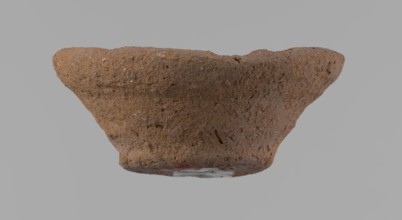Bowl, probably votive, conical shape with flat bottom. Irregular walls; straight, slightly flaring