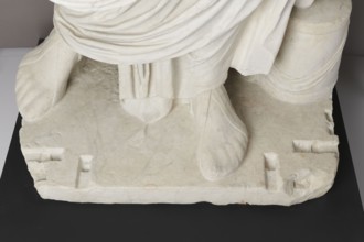 Roman statue, unknown Roman workshop. The figure of a standing man dressed in a tunic and toga,