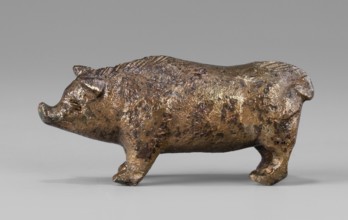 A small bronze figurine of a pig. The animal stands on rather schematically depicted legs ending in