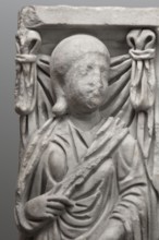 Sarcophagus with a depiction of a married couple and a shepherd, unknown Roman workshop. A large