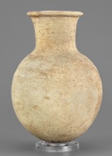 Flask, unknown Northern Mesopotamian workshop. Clay flask-shaped vessel with an elongated ovoid