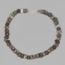 Necklace, unknown Northern Mesopotamian workshop; jewellery of frit beads; composed of forty-eight