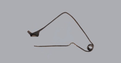 Fibula, Bronze Etruscan fibula with a bent ring made of flatly beaten wire, passing in a three-turn