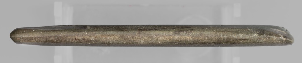 Rectangular paddle with a hole at one of the shorter edges; possibly a whetstone. Flat rectangular