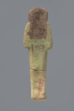 Ushabti ?-en-Khonsu, Mummy-shaped figurine shabti. Arms crossed on the chest, right folded over