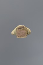 Ushabti ?-en-Khonsu, Mummy-shaped figurine shabti. Arms crossed on the chest, the right folded over