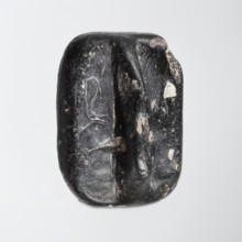 Rectangular stamp seal with a handle in the form of a protruding ridge along the axis of the seal