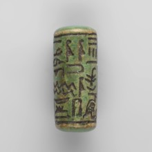 Cylinder seal with pseudo-hieroglyphs;, Cylindrical seal with a hole drilled along the cylinder.