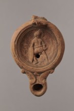 Lamp decorated with a depiction of a gladiator so-called Samnite, unknown Roman workshop,