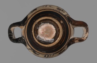 Miniature skyphos. Reddish clay, black-brown firnis poorly covering the outside on the foot, at the